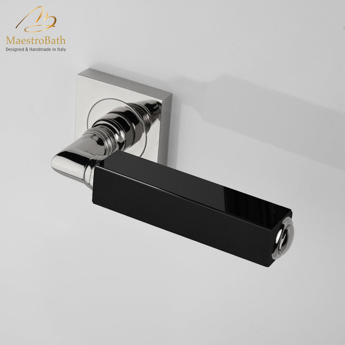 Brass and crystal door handle, shown in black and chrome, 5.3 inch by 1.9 inch by 2.9 inch