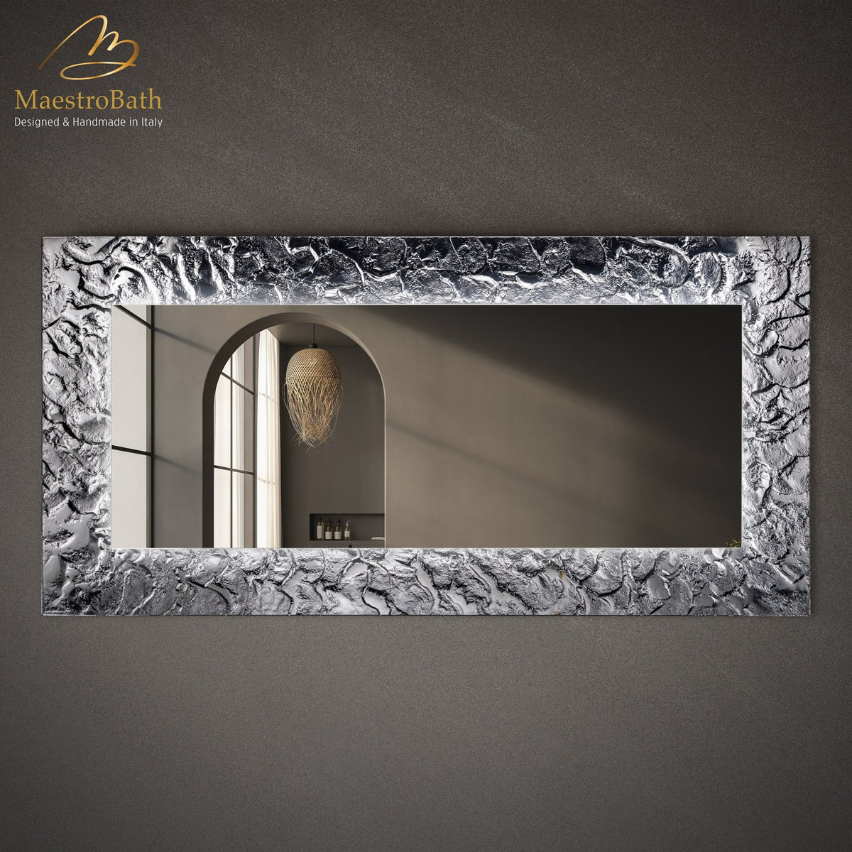 Wall mounted Murano glass bathroom vanity mirror, shown in gray-smoke silver, with LED lighting
