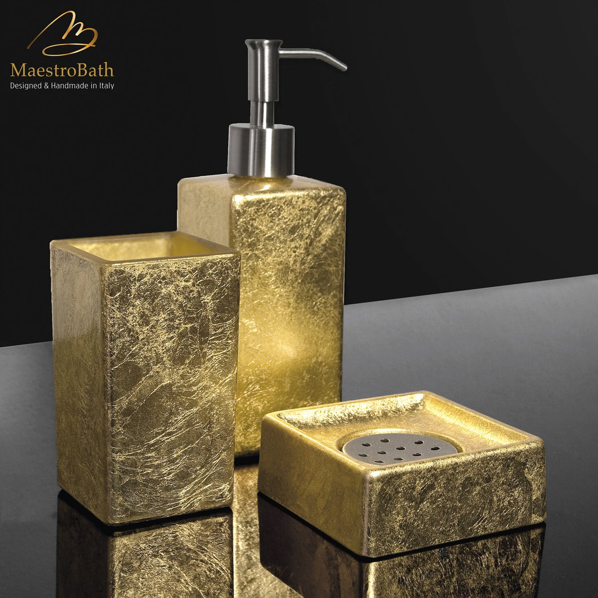 Resin and glass soap dispenser, shown in gold leaf, 2.5 inch by 2.5 inch by 7.8 inch