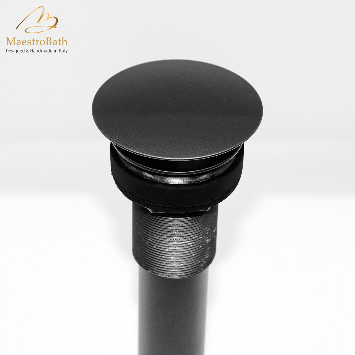 Brass vessel sink drain, shown in black, 2.3 inch across and 9.3 inch deep, made of lead-free brass