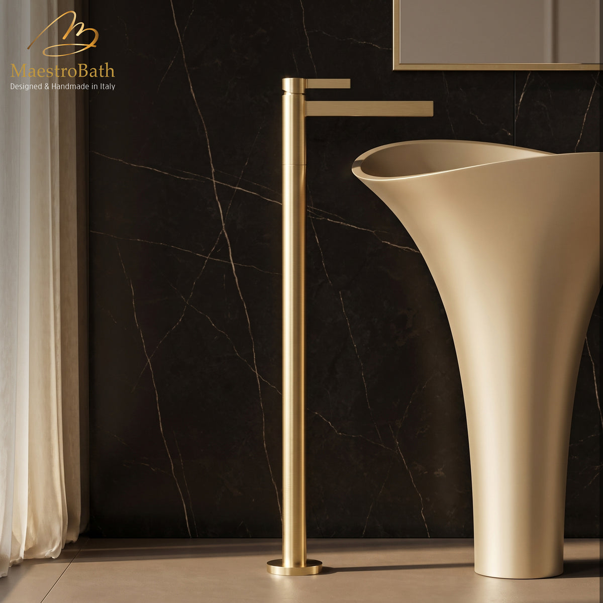 CASO freestanding bathroom faucet in brushed gold, floor mounted beside a champagne gold pedestal sink #color_brushed gold