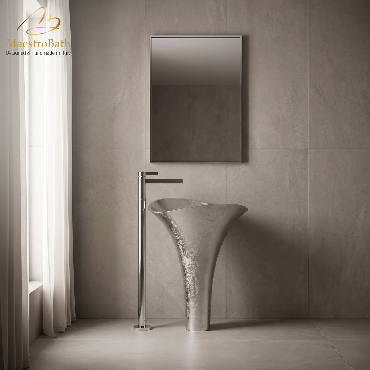 Polished chrome freestanding bathroom faucet and silver leaf pedestal sink in a light stone bathroom with a wall mirror #color_polished chrome