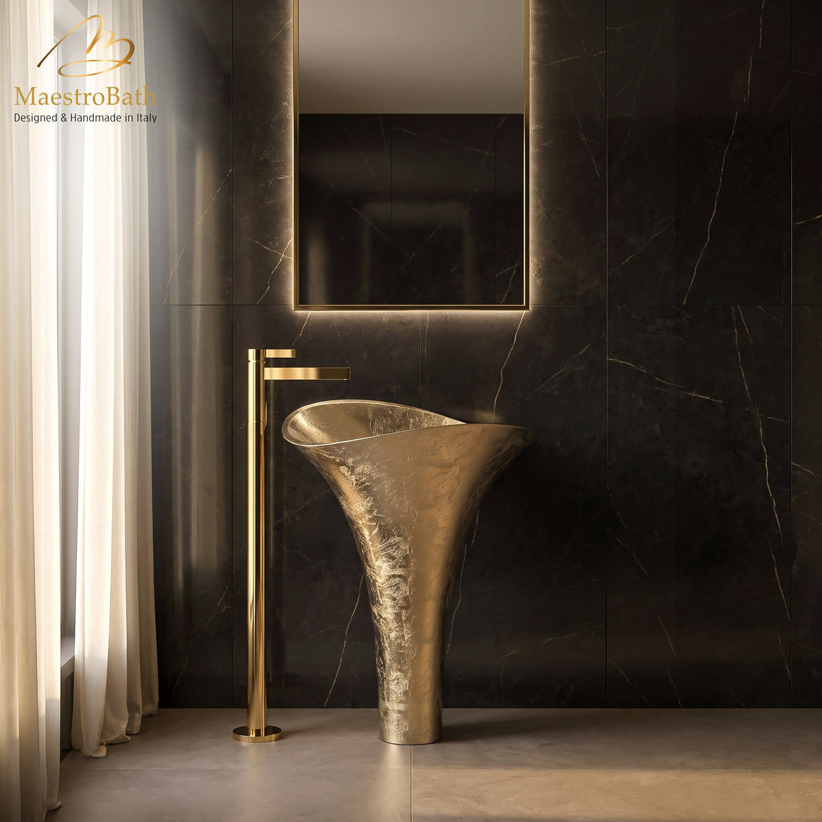 Polished gold floor mounted bathroom faucet and gold leaf pedestal sink in a dark marble bathroom with a backlit mirror #color_polished gold