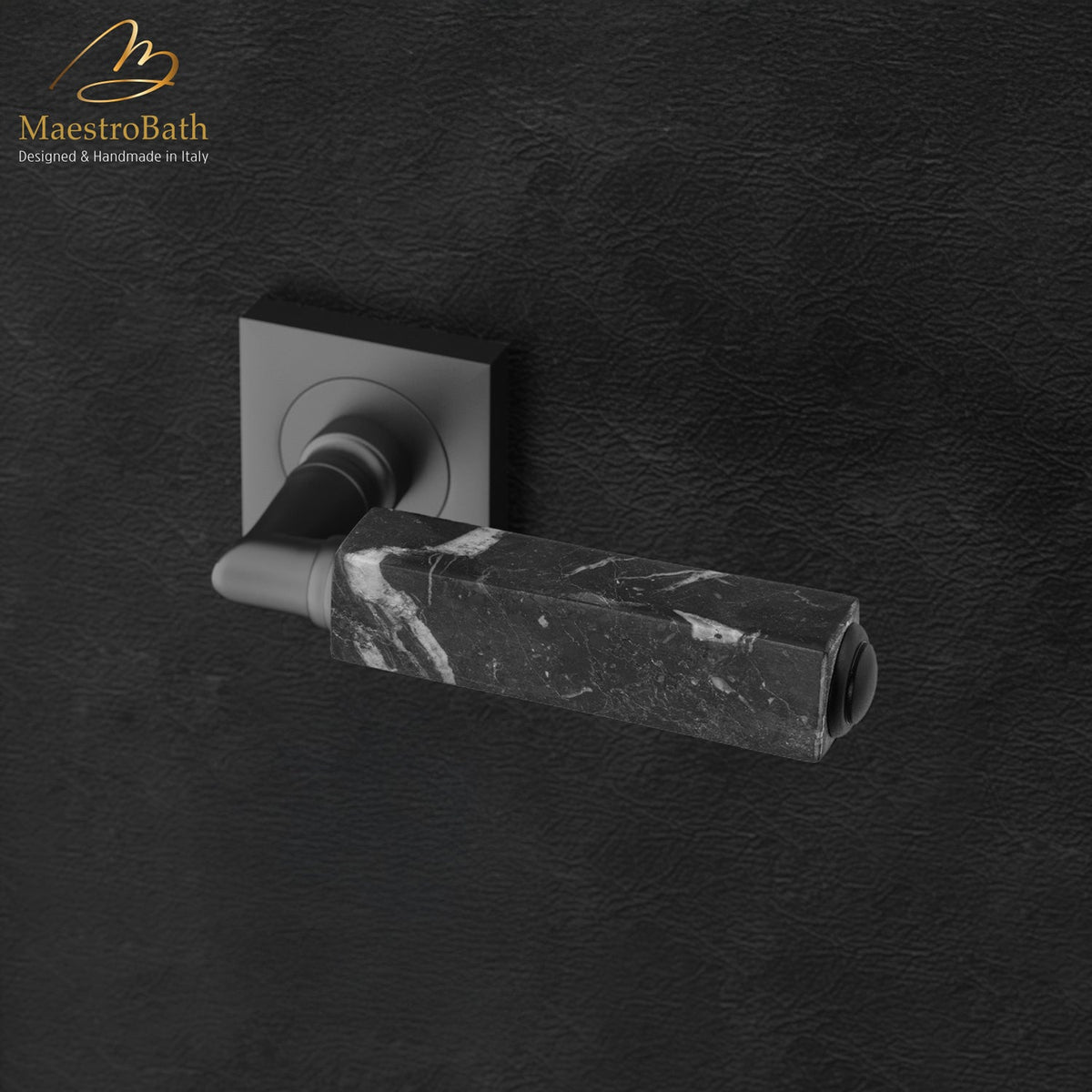Brass and marble door handle, shown in black, 5.3 inch by 1.9 inch by 2.9 inch