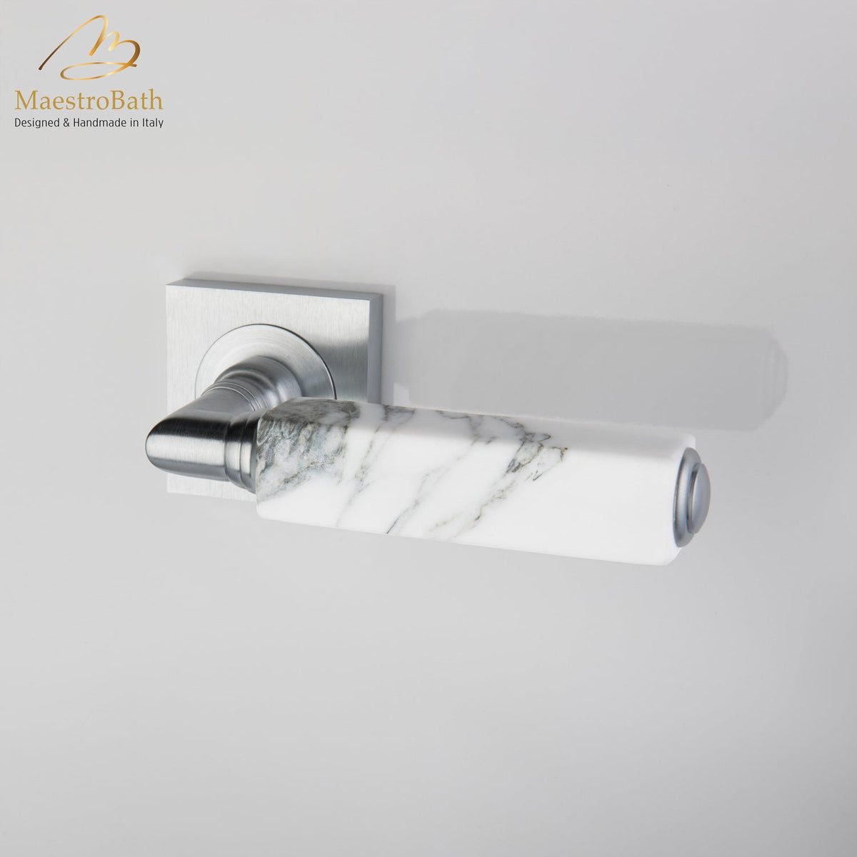 Brass and marble door handle, shown in white and brushed chrome, 5.3 inch by 1.9 inch by 2.9 inch
