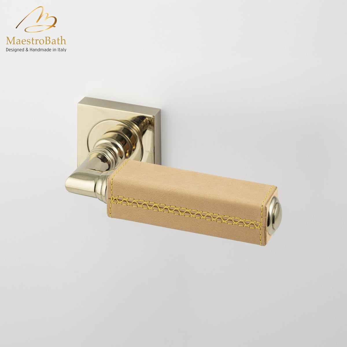 Brass and leather door handle, shown in camel and champagne, 5.3 inch by 1.9 inch by 2.9 inch