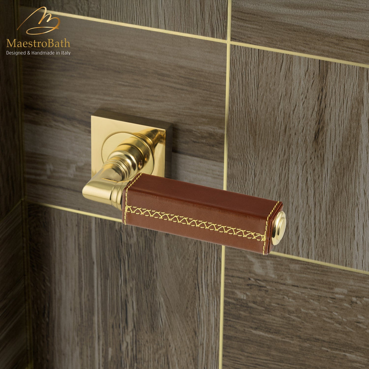 Brass and leather door handle, shown in natural and polished brass, 5.3 inch by 1.9 inch by 2.9 inch