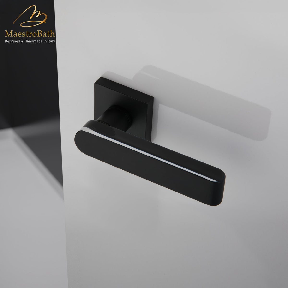 Brass and crystal door handle, shown in black, 5.3 inch by 2 inch by 2 inch