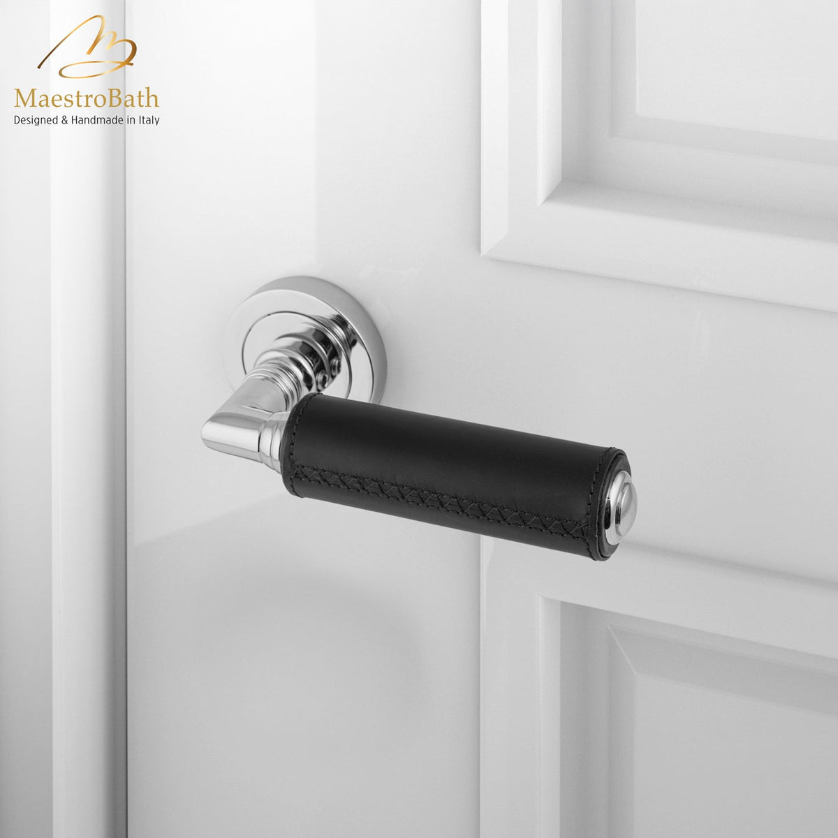 Brass and leather door handle, shown in black and chrome, 5.5 inch by 1.9 inch by 2.5 inch