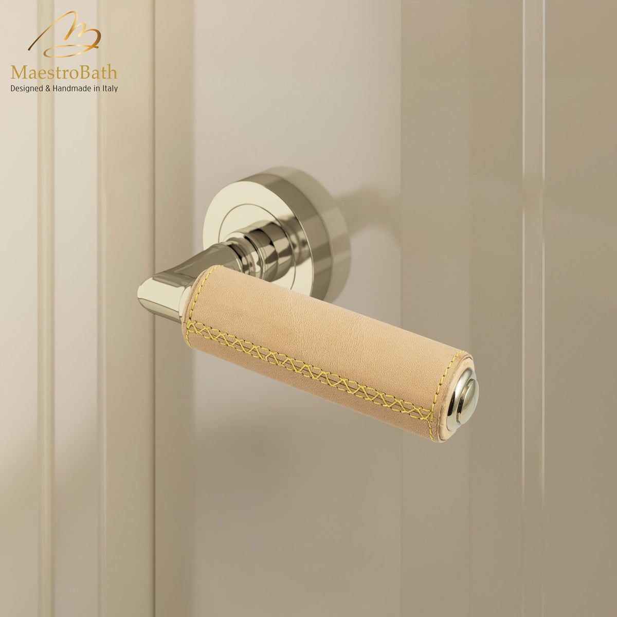 Brass and leather door handle, shown in camel and champagne, 5.5 inch by 1.9 inch by 2.5 inch