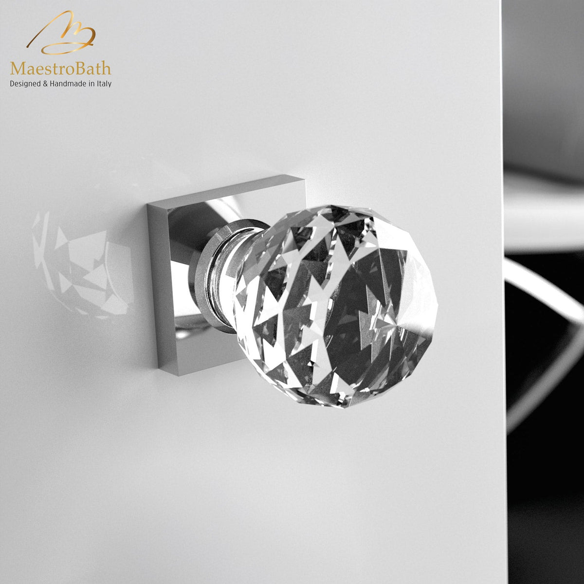 Brass and crystal door handle, shown in clear and chrome, 2 inch by 1.9 inch by 2.9 inch