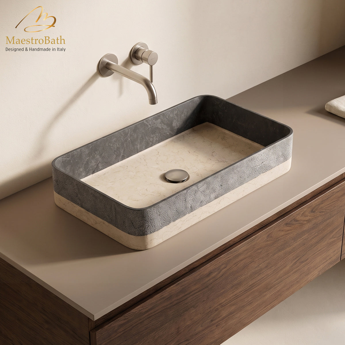 Above counter natural stone vessel sink, shown in black, 24.5 inch by 13.8 inch with a 4.7 inch basin depth