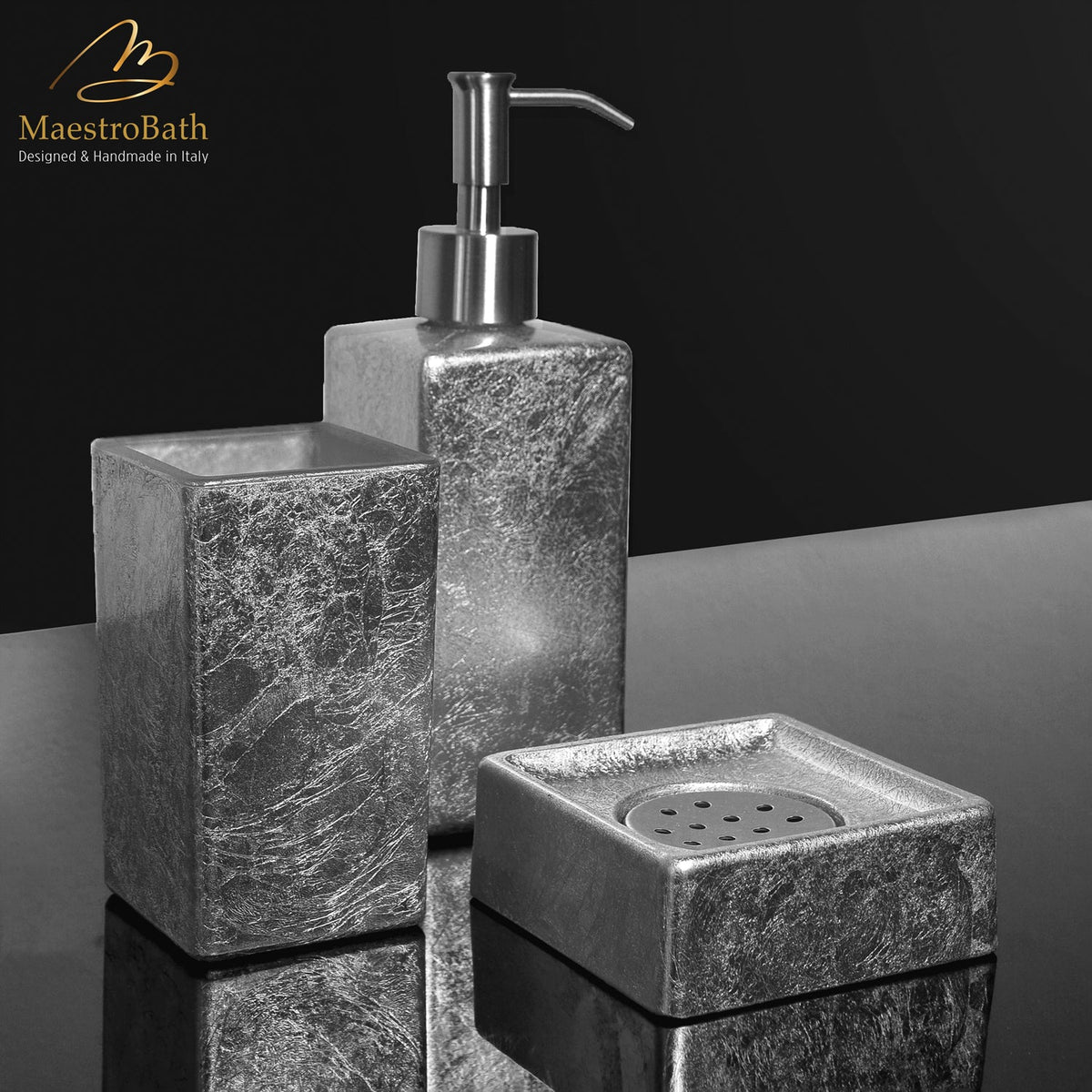 Resin and glass soap dispenser, shown in silver leaf, 2.5 inch by 2.5 inch by 7.8 inch