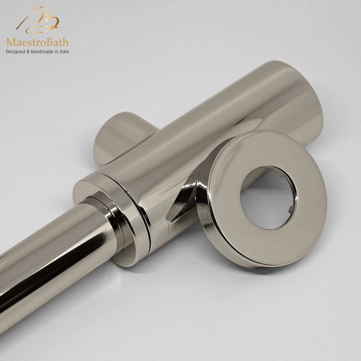 Cylindrical brass trap and flange kit, shown in stainless steel, 1.7 inch across and 18.5 inch deep, made of lead-free brass